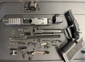 Disassembled pistol for Gunsmith cleaning